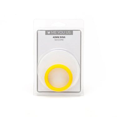 a yellow ring in a package on a white background